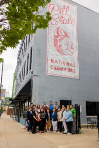 Group photo of Aberdeen delegates outside a building