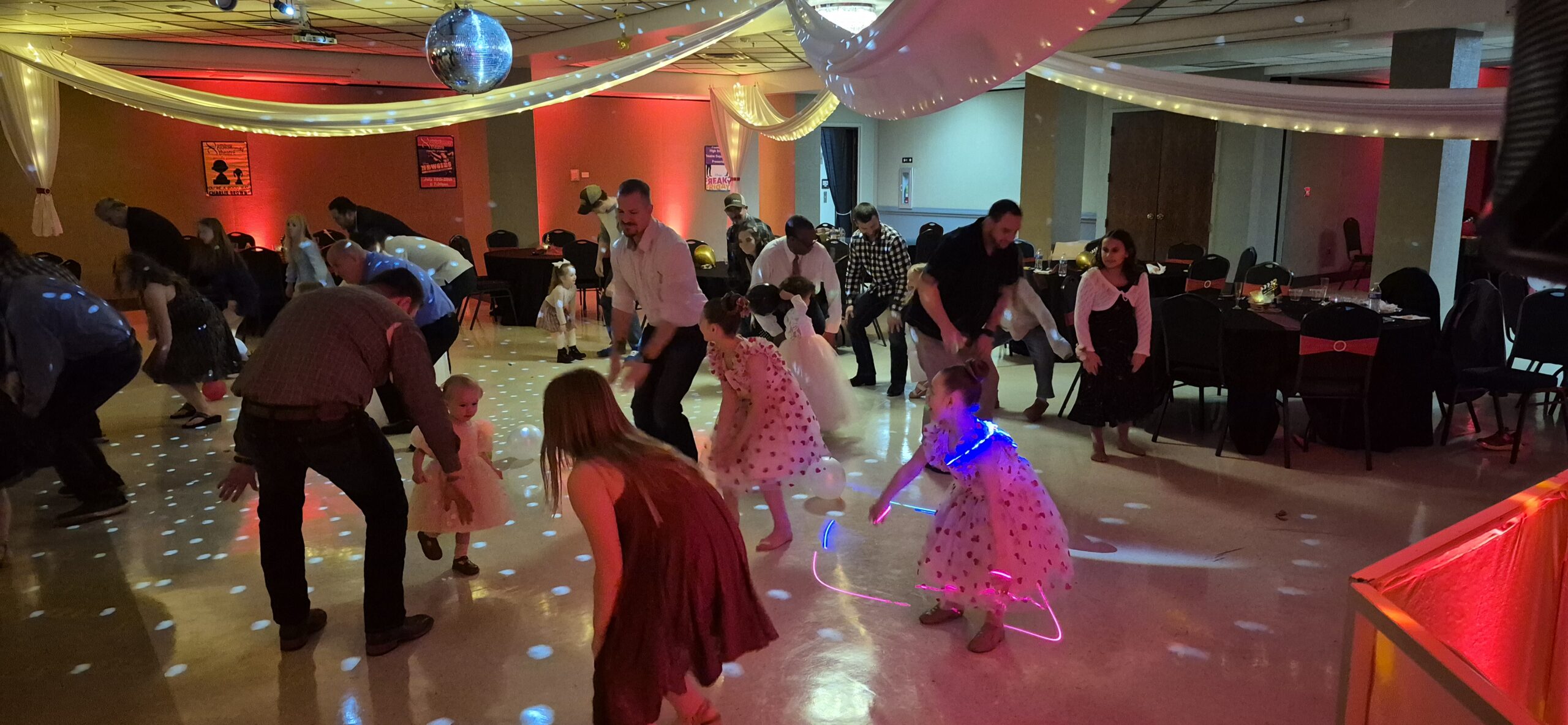 Dads and daughters dancing