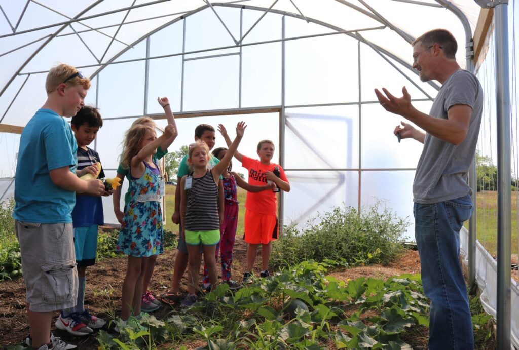 Camp Kids Visit CTEC High Tunnel