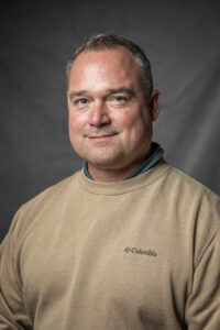A portrait of a Kris Loy