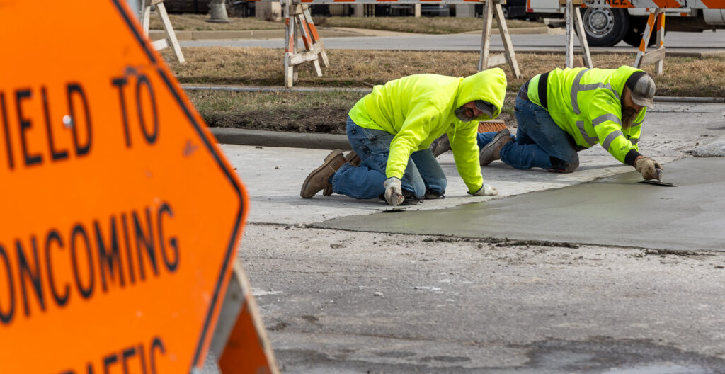 Pittsburg, Kansas street repair by workers